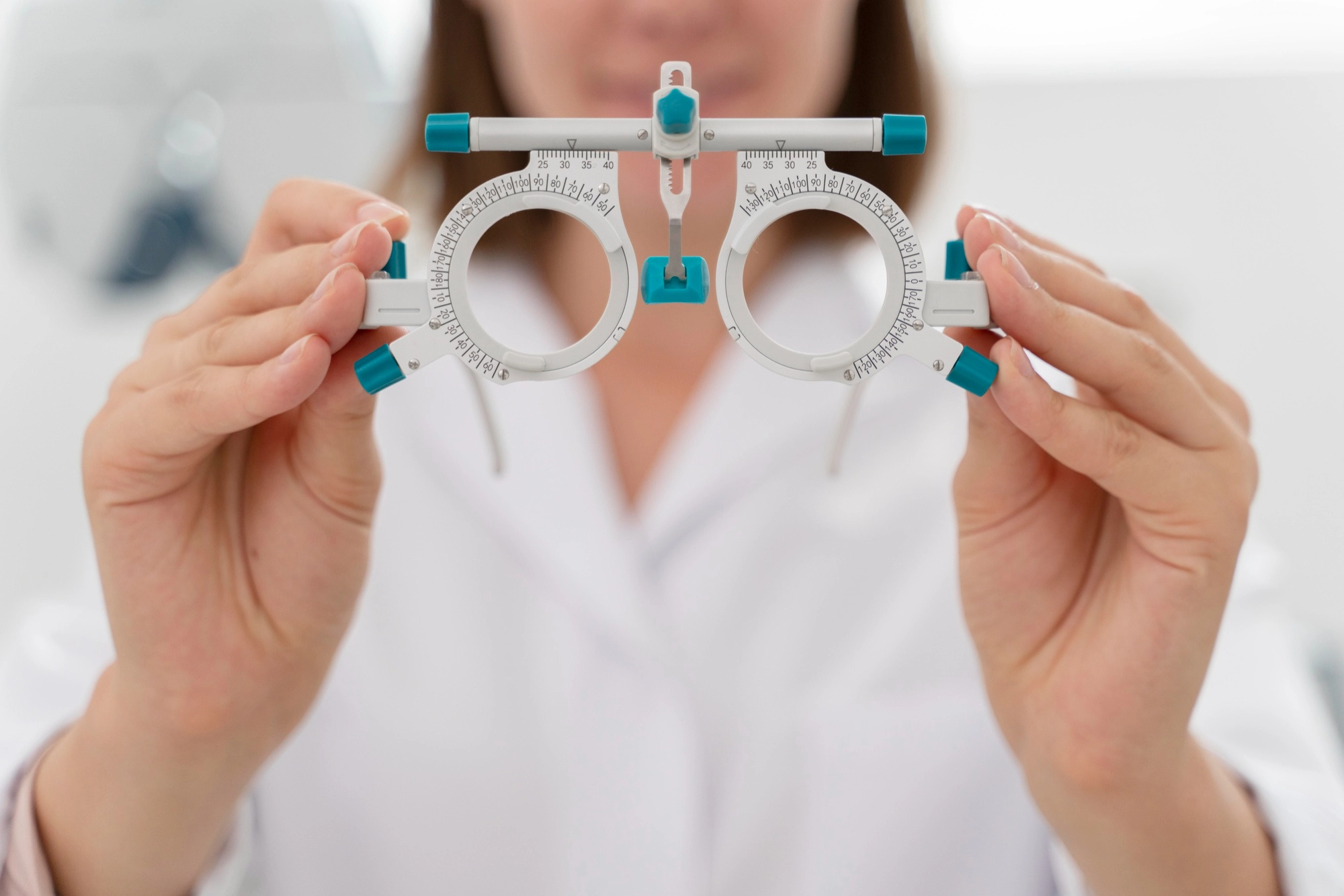 Optometrist conducting a comprehensive eye examination using a slit lamp microscope
